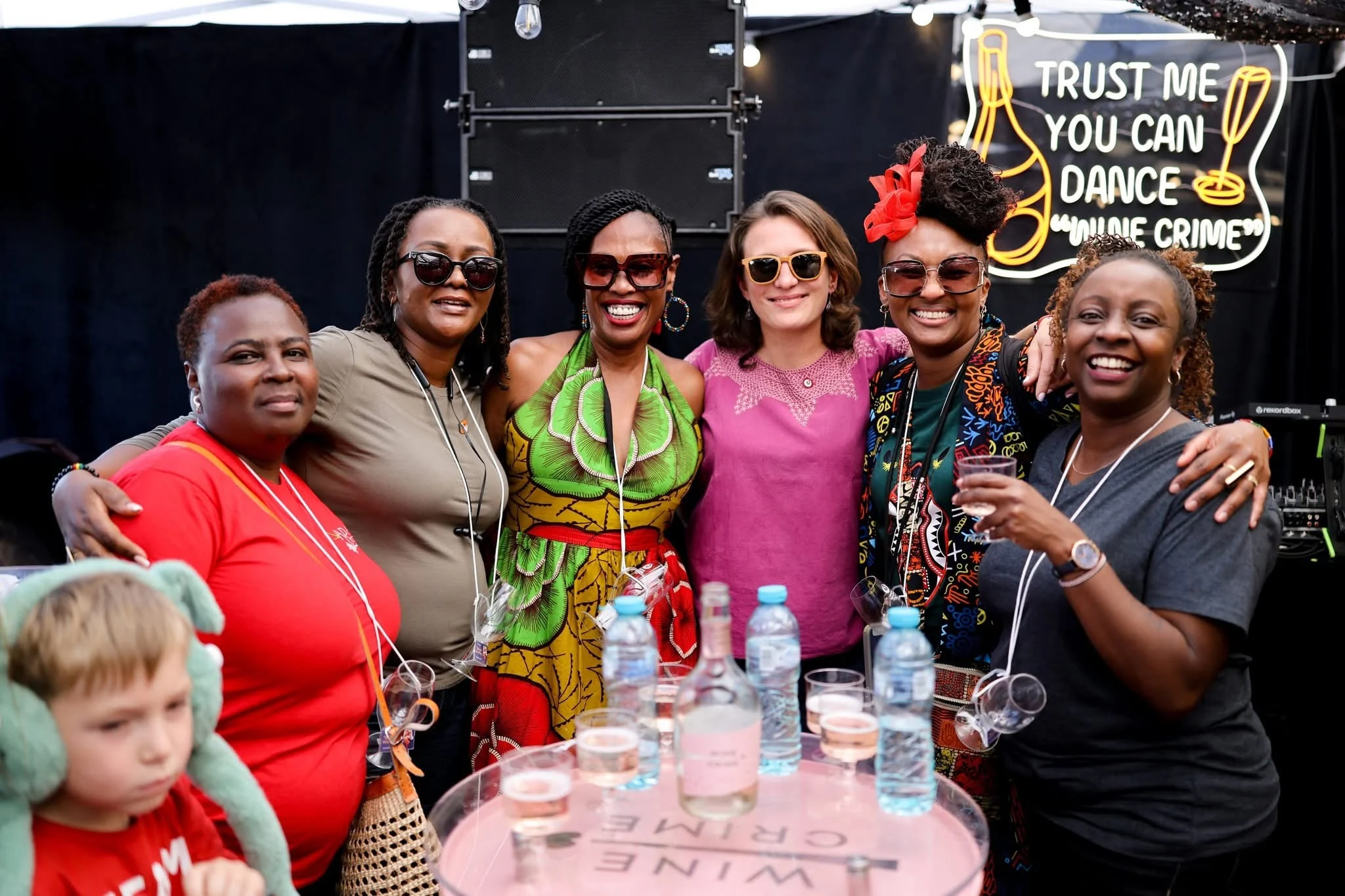 Group gathered around a table at a wine event